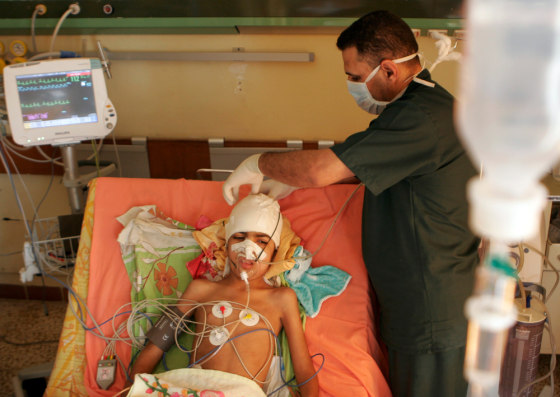 Image: Hiba Mohammed, an eight-year old Iraqi girl, is treated at a hospital in Baghdad
