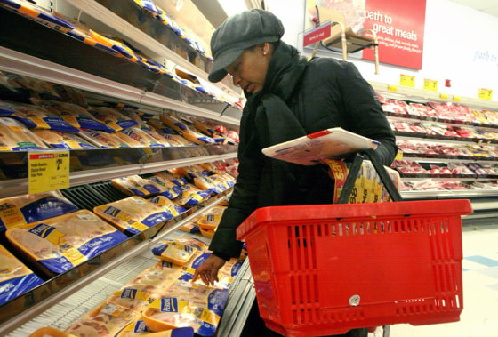 Image: Woman shops for groceries.