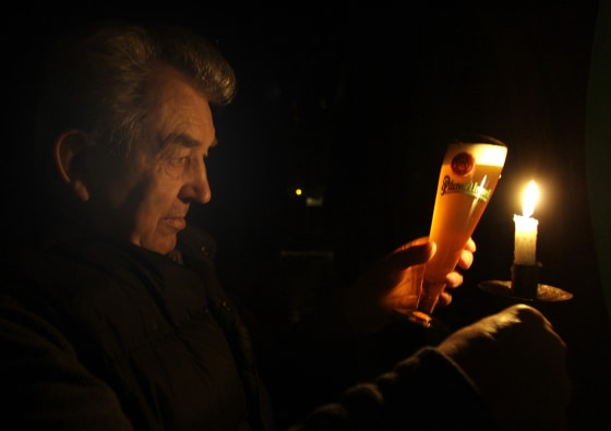 Image: Jan Blaha checks the quality and color of the unpasteurized beer