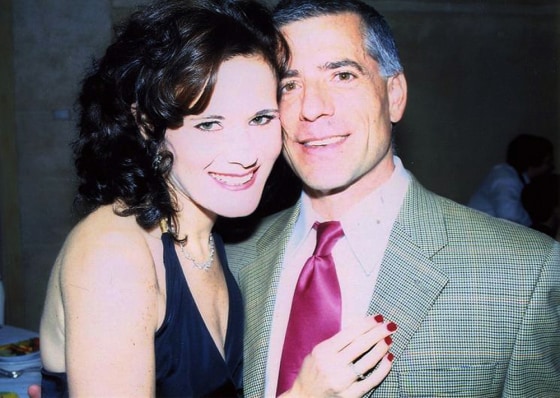 Frank Scudere, seen with his wife, Johannah, wasn't injured in the flight that went into the Hudson River but was then laid off from the giant law firm Skadden, Arps. "I feel displaced. Who am I? My identity as an attorney — that's gone."