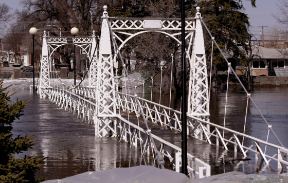 Image: foot bridge is flooded by the Sheyenne River