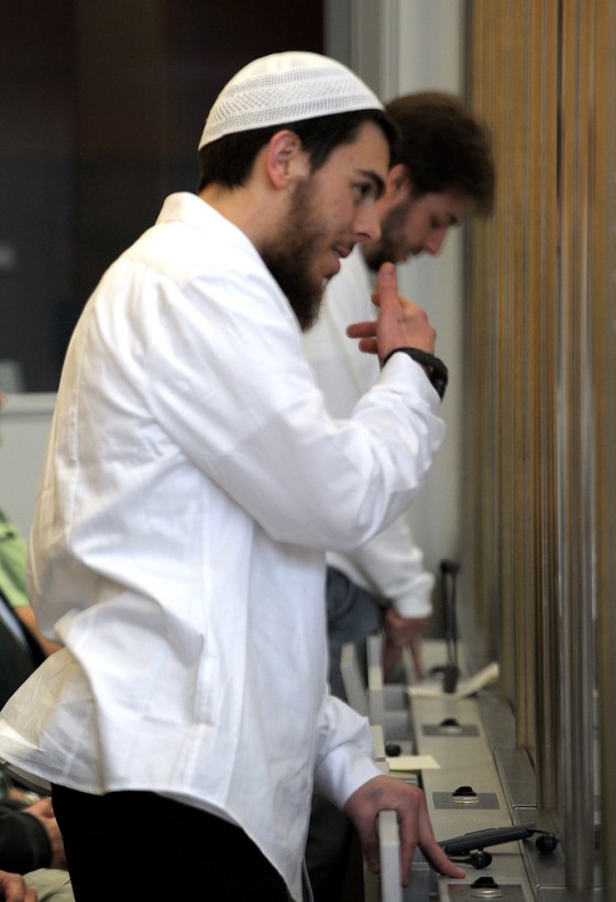 Image: Sauerland group defendants Schneider and Gelowicz appear in high-security court in Duesseldorf