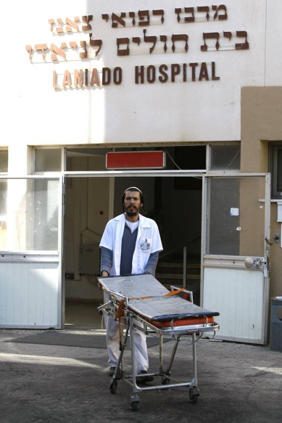 Image: A medic pushes an empty trolley at the Laniado hospital
