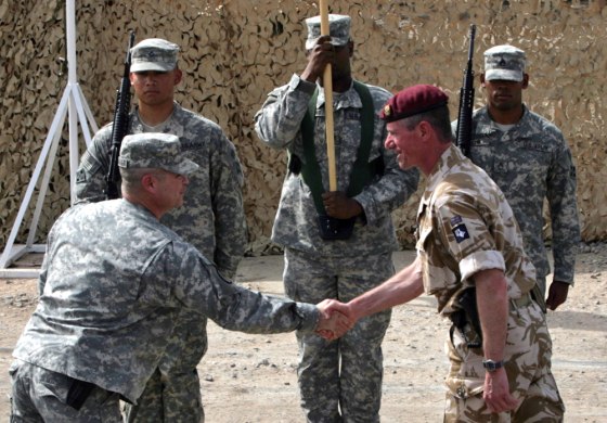 Image: Commander 20th Armoured Brigade, Brigadier Tom Beckett shakes hands with Colonel Henry A Kievenaar, US Commander 2-4 BCT