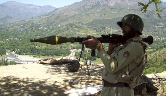 Image: Pakistani paramilitary soldier poses with rocket launcher