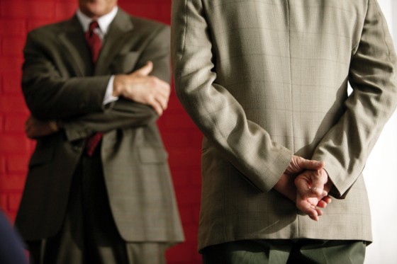 Image: two people engaged in conversation