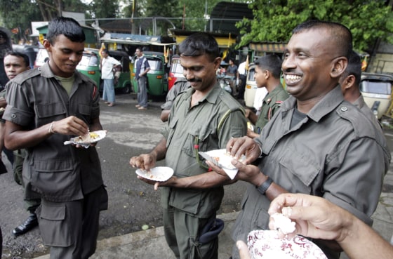 Image: Sri Lankan soldiers eating milk rice