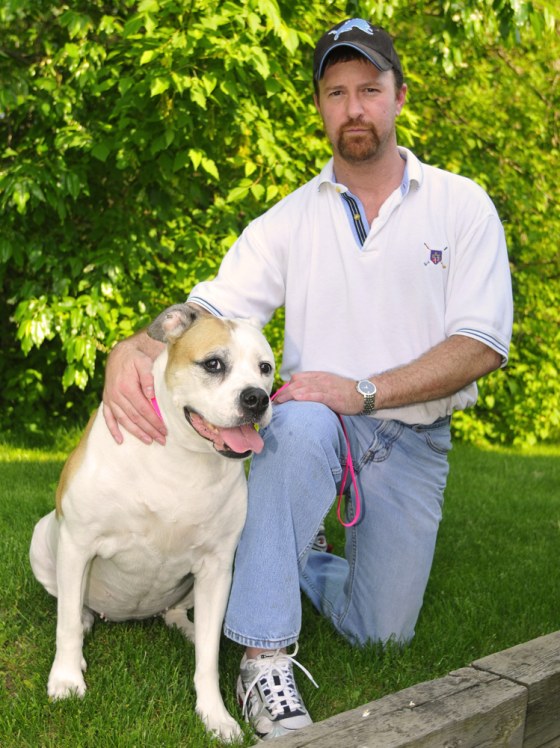 Image: Scott Seymour and his 9-year-old American Bulldog, Brittney.