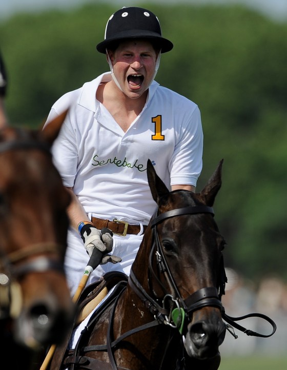 Image: Prince Harry reacts while playing in the second annual Veuve Clicquot Manhattan Polo Classic