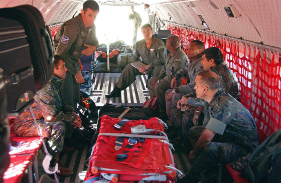 Image: Members of the Brazilian Pelican military squad prepare to departure for search