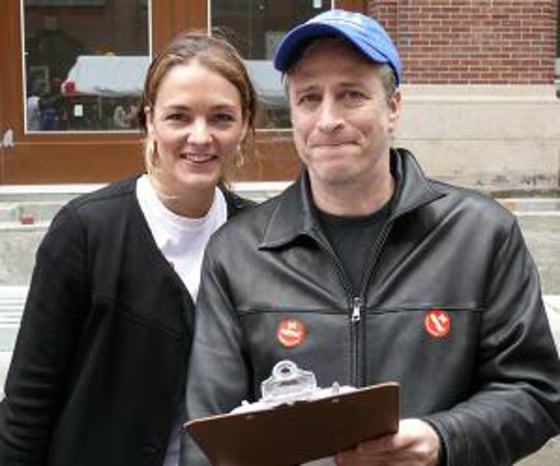 Jon Stewart stands with Katharina Harf, executive vice president of DKMS, the world's largest bone marrow donor center, at the Montessori School of Manhattan marrow drive on May 2.