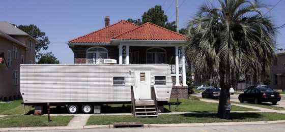 Image: A FEMA trailer sits in the front yard of a home in the Lakeview section of New Orleans