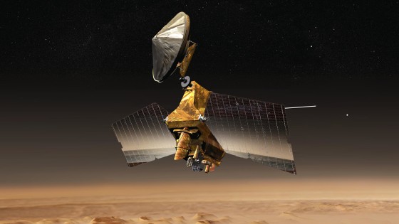 An artist's conception shows NASA's Mars Reconnaissance Orbiter above the Red Planet's surface.