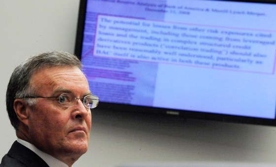 Image: Lewis looks at a memo being projected on the walls during testimony before the House Oversight and Government Reform Committee in Washington