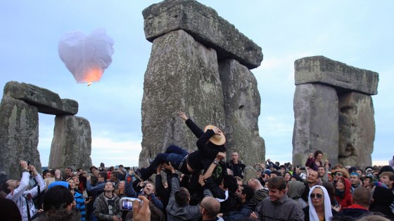 Image: Revellers celebrate summer solstice at Stonehenge