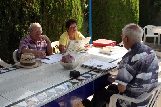 Gill Burden, center, and Michael Trump, left, who moved to southern Spain about three years ago, attend one of their weekly Spanish lessons. The falling pound, collapsing house prices and dwindling pension income have virtually trapped the two British retirees.