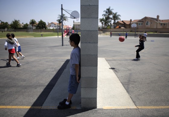 Image: Students play on the playground during a lunch break at Rolling Ridge Elementary School
