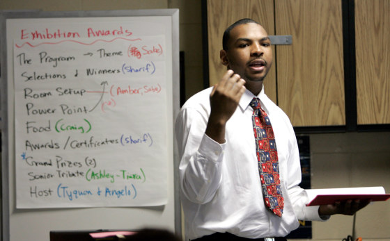 Image: Angelo Drummond, a 17-year-old junior at MetEast High School in Camden, N.J., presents his class project of designing and funding a lounge for teenagers to classmates