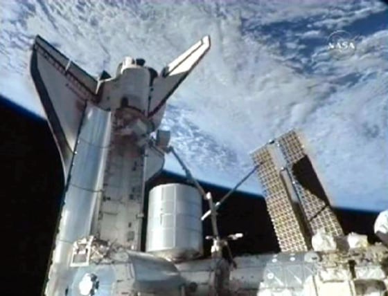 Image: A camera mounted on the International Space Station provides this image from NASA TV of the Space Shuttle Discovery's payload bay