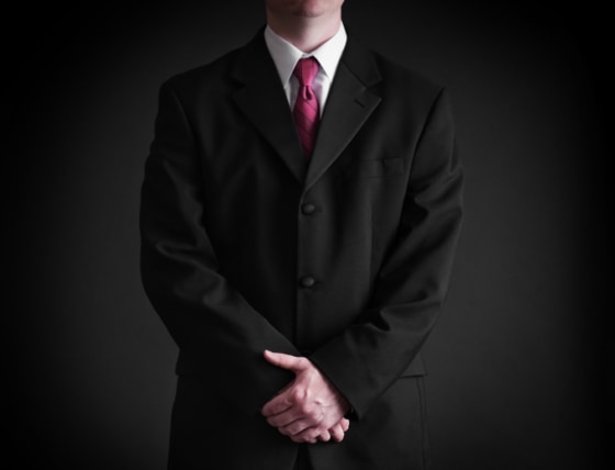Man wearing pink tie.