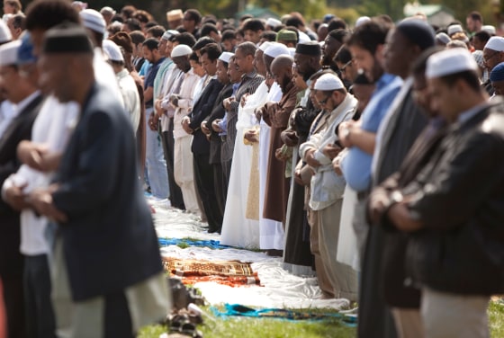 Image: Muslims gather to pray on the East Front of the Capitol in Washington