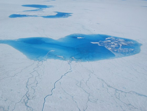Melt ponds like these form every summer on Greenland, but experts say the rate of melting on the vast ice sheet is speeding up.