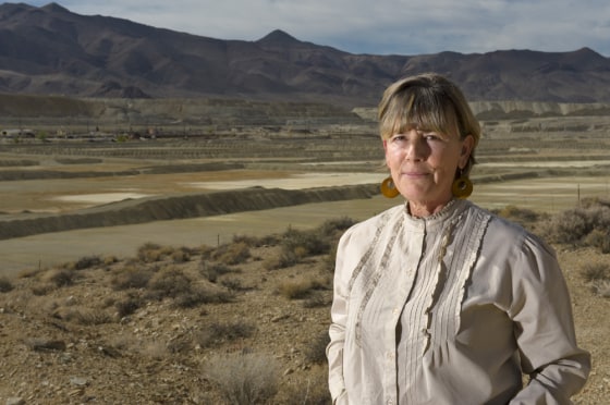 Peggy Pauly, who rallied neighbors around Yerington, Nev., stands in front of the leach ponds of the former Anaconda copper mine that are tied to groundwater contamination.