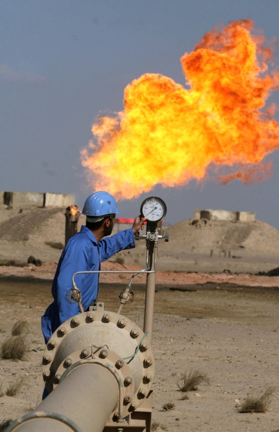 Image: An engineer works at the Barjisiya oil fields in Iraq