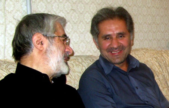 Image: Iranian opposition leader Mir Hossein Mousavi, left with his nephew Ali Mousavi