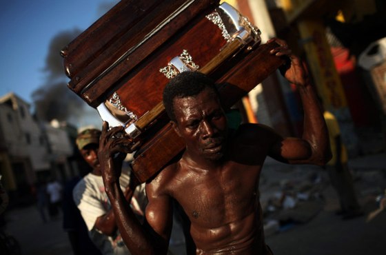 Image: A coffin was carried through the streets