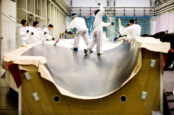 As China takes the lead on wind turbines, above, and solar panels, President Barack Obama is calling for American industry to step up. 