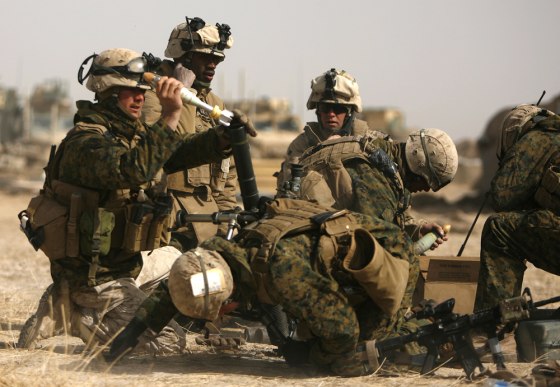 Image: U.S. Marines fire mortar rounds on Taliban positions
