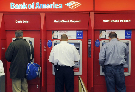 Image: Customers using ATMs