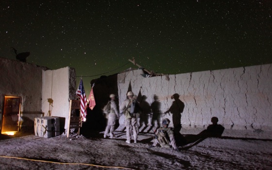 Image: U.S. Marines with Alpha Company gather before a night mission