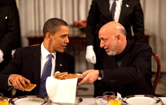 Image: President Hamid Karzai chats with President Barack Obama