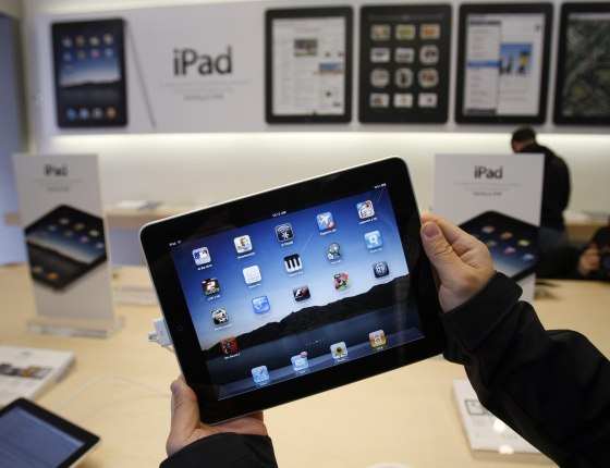 Image: Customer uses an Apple iPad