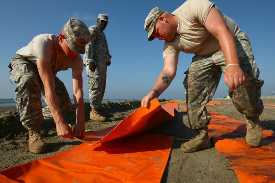 Image: Louisiana National Guard install dams as oil barriers
