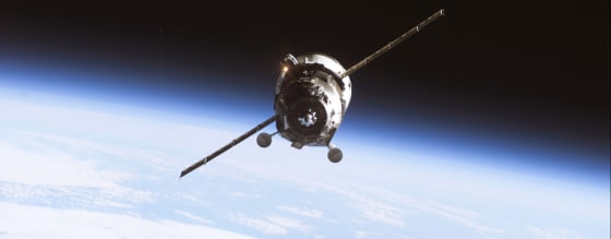 Image: An unmanned Progress supply vehicle approaches the International Space Station in undated handout photograph