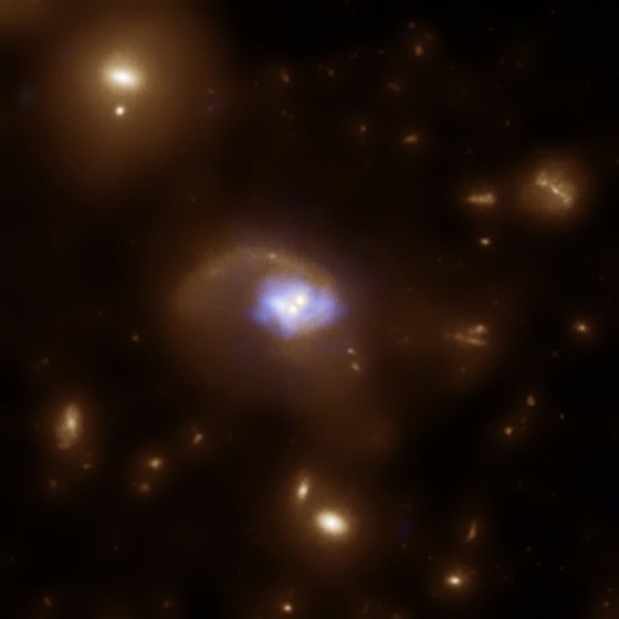 Image: Black holes and stars in space