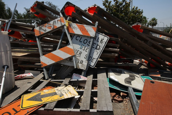 Image: Road signs piled in Maywood, Calif.