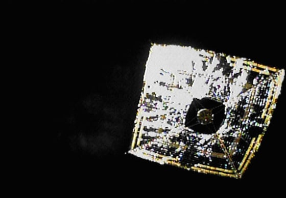 Japan's Ikaros spacecraft is the vanguard of solar sail propulsion. It launched in May 2010 and is shown here in June in photos snapped by a small camera ejected by the space sailcraft while flying in deep space.