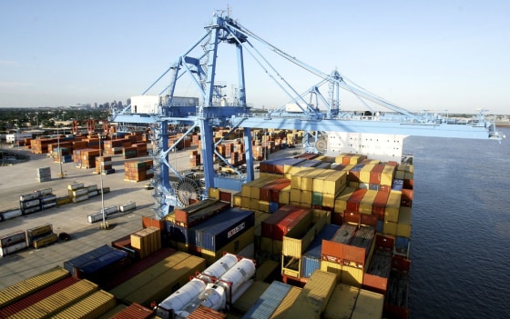 Image: Crews load and unload consumer products at the Port of New Orleans along the Mississippi River in New Orleans, Louisiana