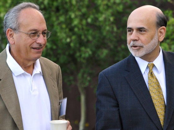Image: Federal Reserve Chairman Bernanke speaks with Vice Chairman Kohn at the Jackson Hole Economic Symposium in Grand Teton National Park