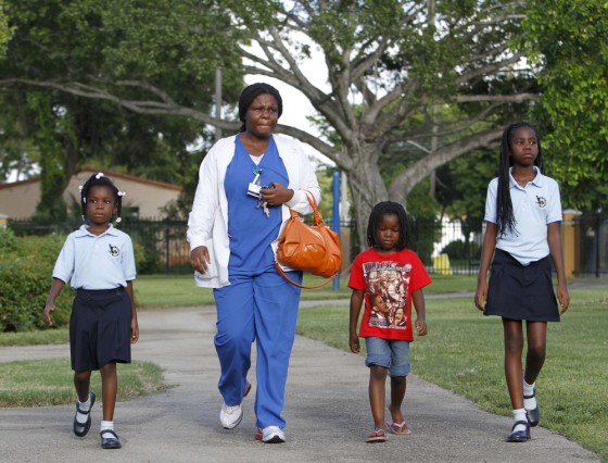 Image: Tesheda Mansfield with her daughters