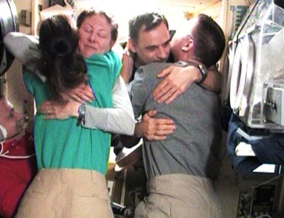 Image: Farewell hugs