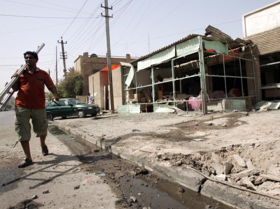 Image: Civilians wounded in road side bomb blasts in Baghdad