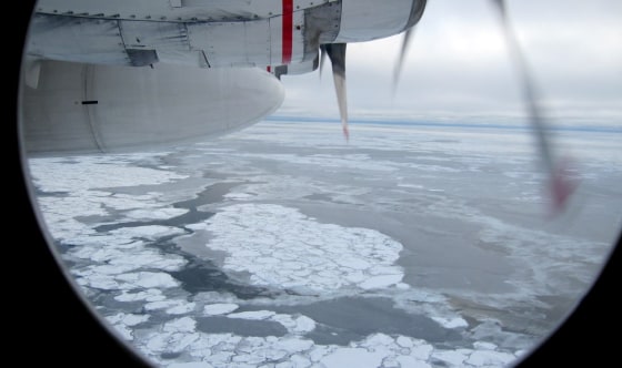 Image: Broken Arctic sea ice as seen from a window in from a U.S. Coast Guard C130 flight over the Arctic Ocean