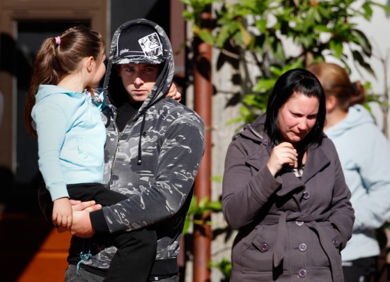 Image: Family members of miners trapped underground in the Pike River coal mine leave a progress briefing by mine authorities and police in Greymouth