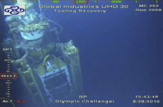 Image: Video grab of the containment capping stack as work continues at the site of the BP oil well leak in the Gulf of Mexico