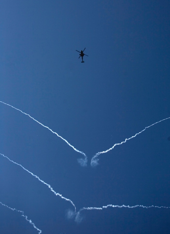 Image: An attack helicopter shoots flares during a support mission for U.S. Marines in Sangin, Afghanistan